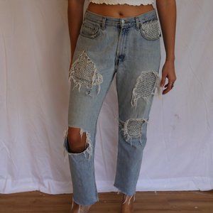 Vintage Levi 505 Regular Fit feat. patch-up flair